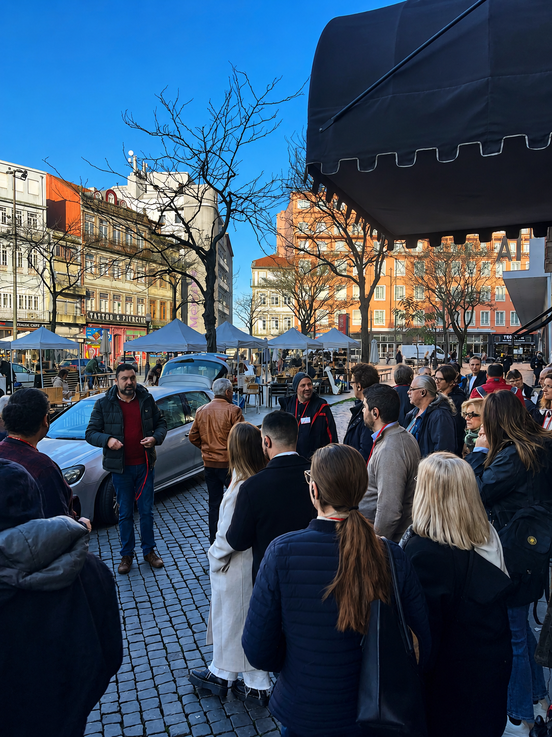 Tour guide leading a group through a European city